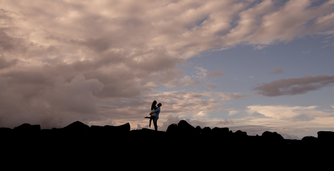 silhoutte image of a engaged couple